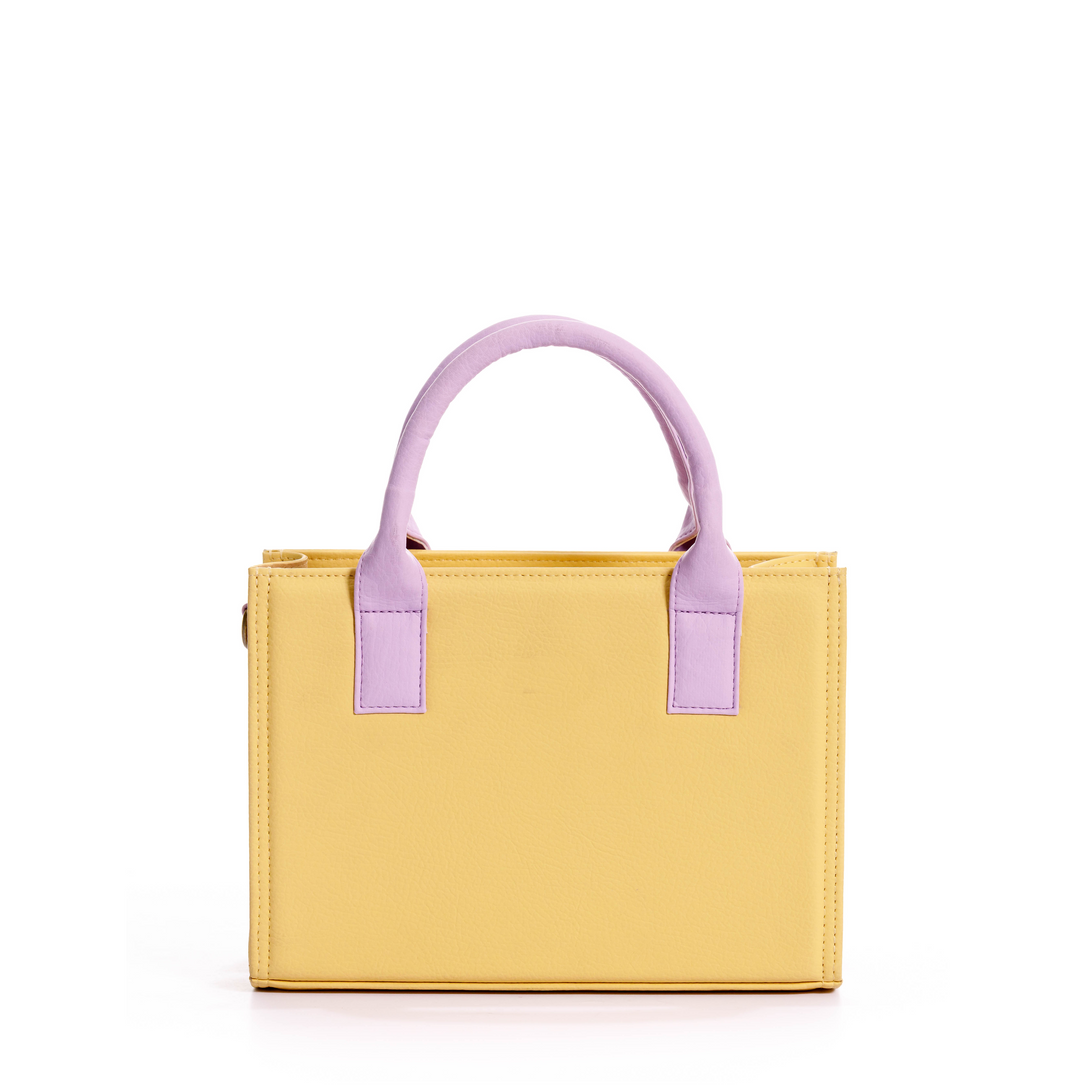 manos libes solido para mujer, fabricado en pvc con correa, en color amarillo y lila