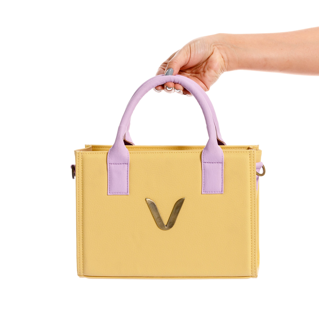 manos libes solido para mujer, fabricado en pvc con correa, en color amarillo y lila