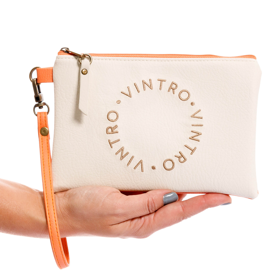 cosmetiquera pequeña, fabricado en pvc con pulsera, y bordado, color naranja