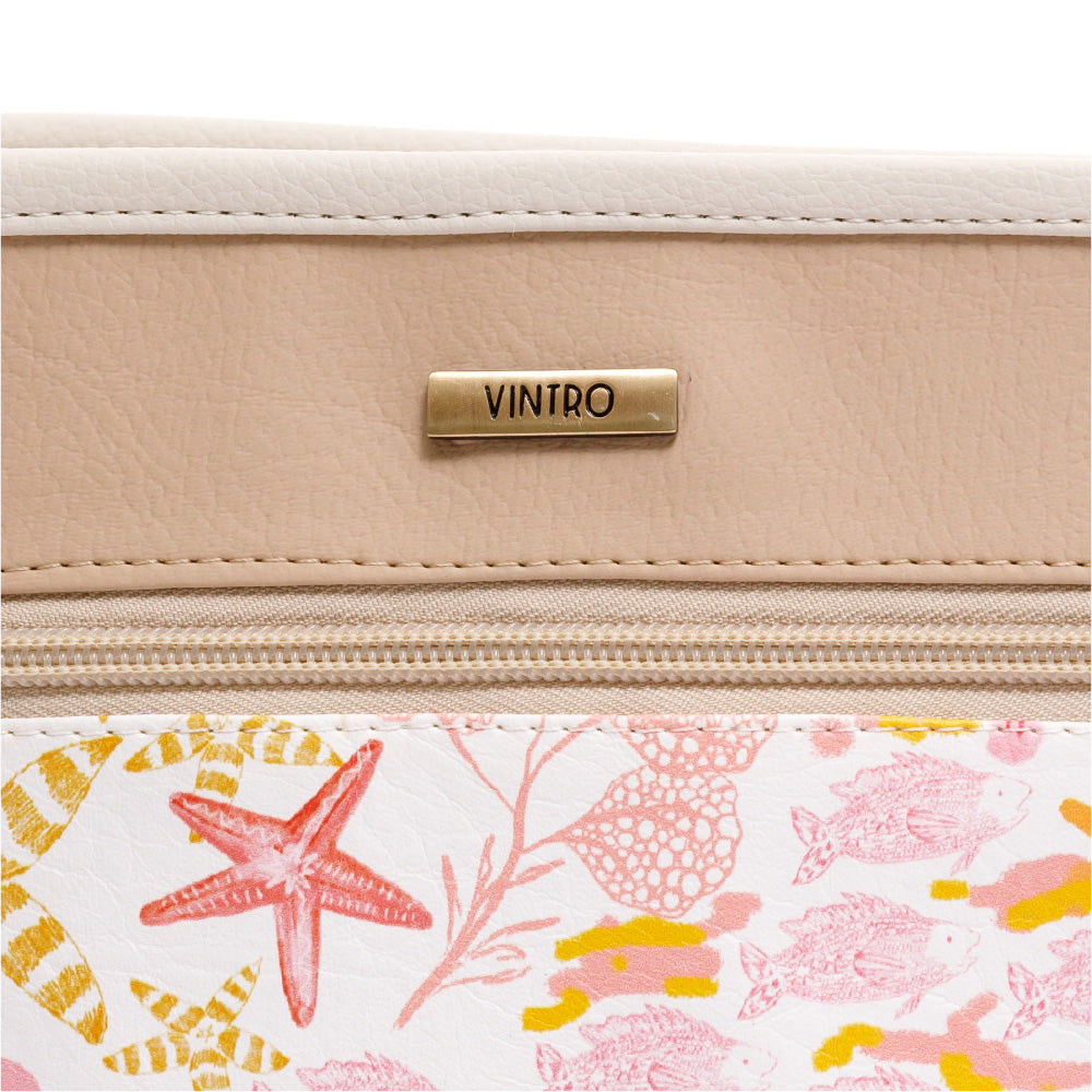 MANOS LIBRES PARA MUJER CHIPRE NARANJA EN CUERO VEGANO CON BOLSILLO EXTERNO