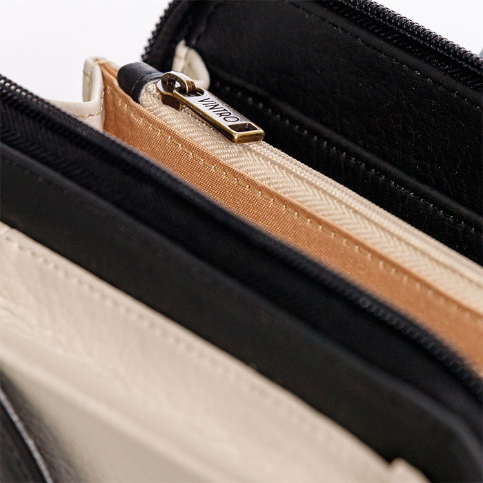 MANOS LIBRES PARA MUJER IBIZA NEGRO SNOOPY CON BOLSILLO EXTERNO Y CARGADERA REMOVIBLE